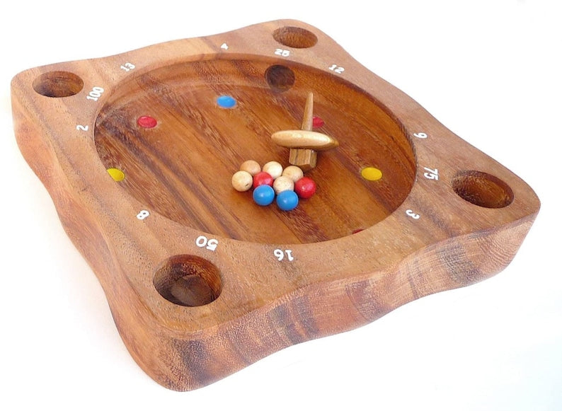 Rollele Roulette ball spinning board game for the whole family. 1