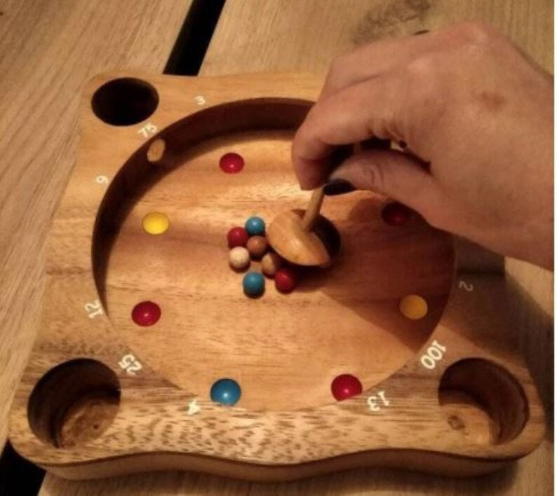 Rollele Roulette ball spinning board game for the whole family. 4