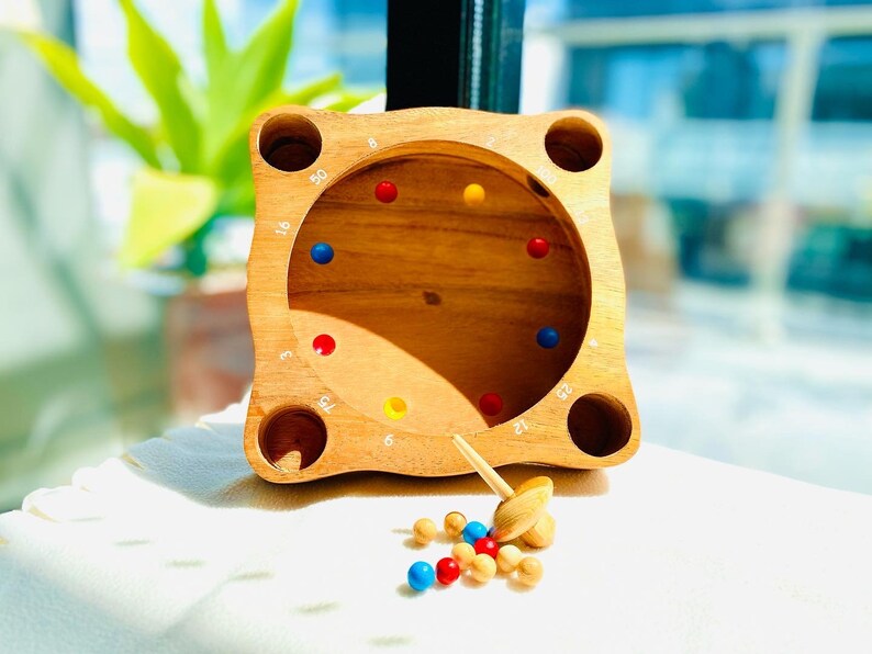Rollele Roulette ball spinning board game for the whole family. 5