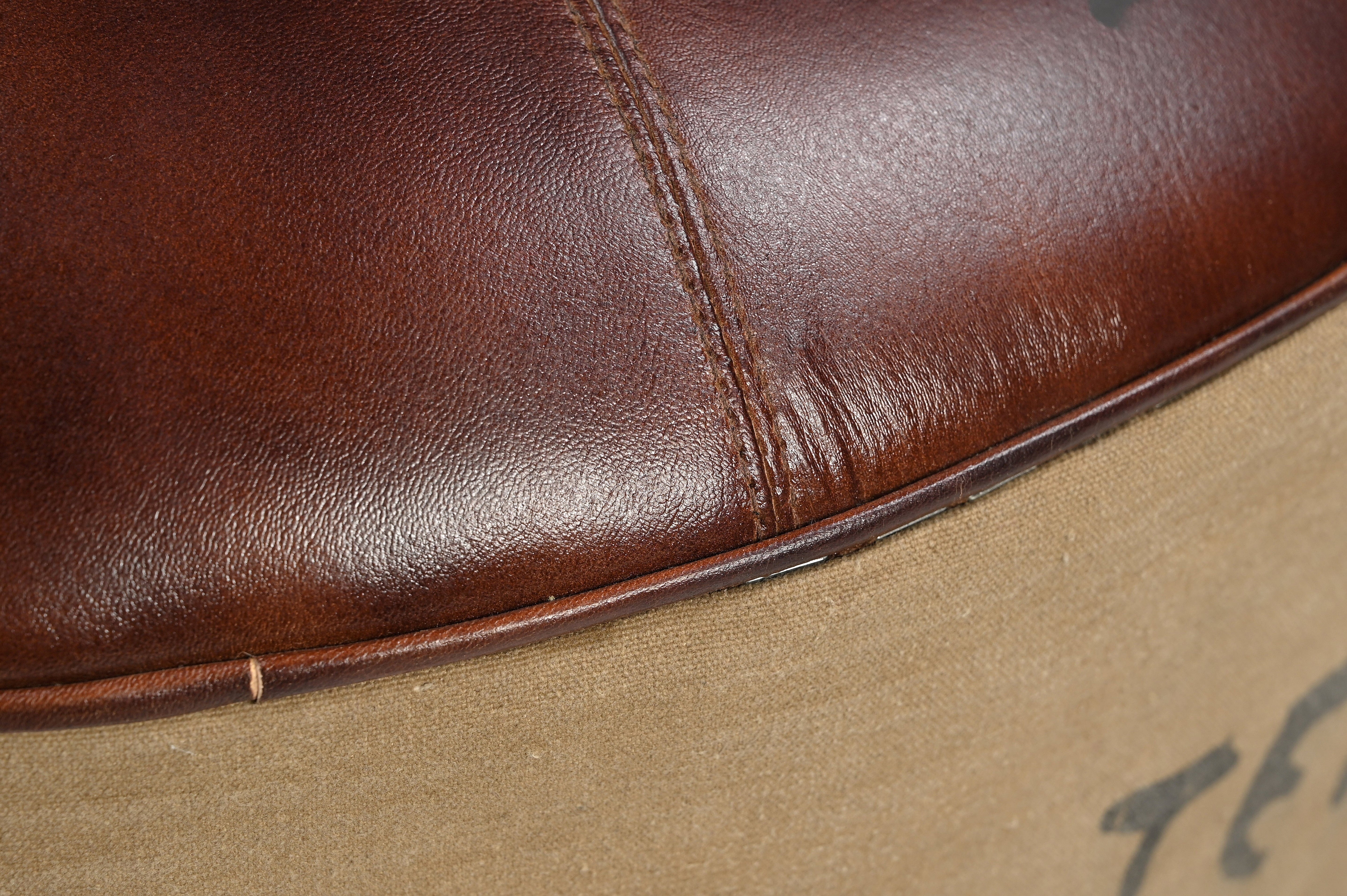 VINTAGE ROUND OTTOMAN 3