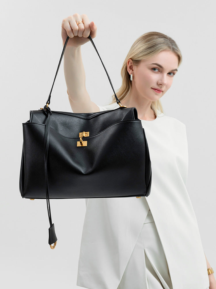 Elegant Black Leather Handbag with Gold Accents - Versatile Shoulder and Hand Carry 3