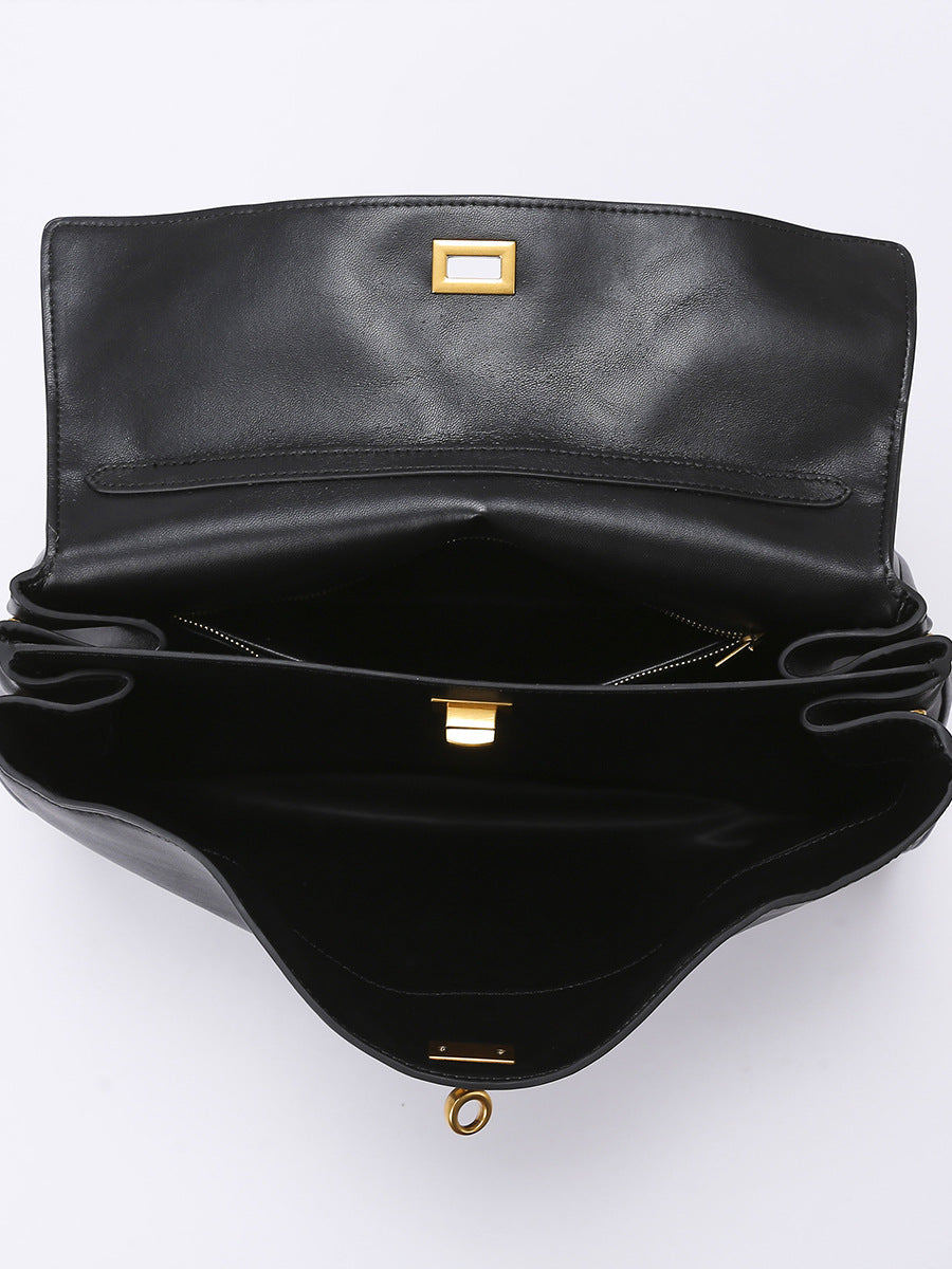 Elegant Black Leather Handbag with Gold Accents - Versatile Shoulder and Hand Carry 4