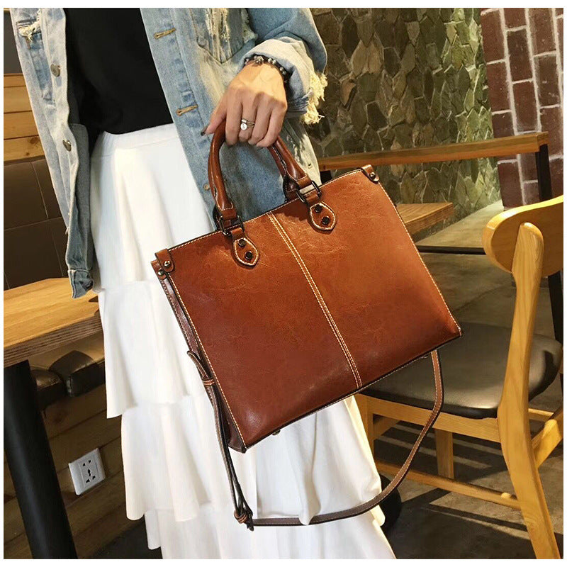 Brown Elegant Leather Handbag - Stylish Brown Tote with Adjustable Strap, Spacious and Durable 3