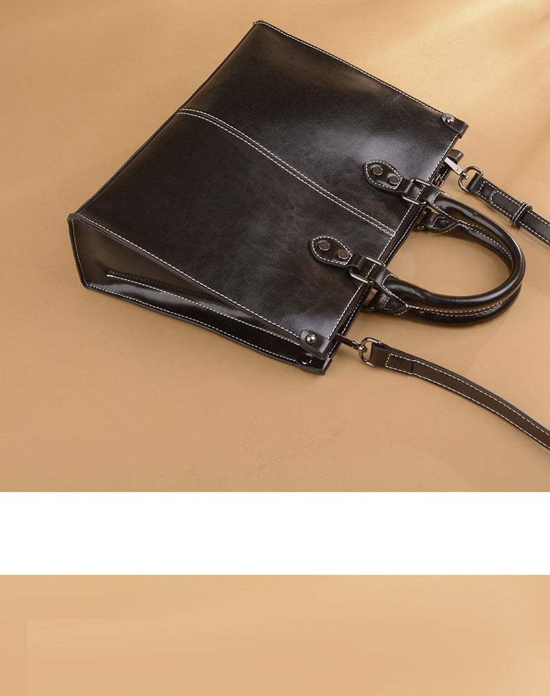 Black Elegant Leather Handbag - StylishTote with Adjustable Strap, Spacious and Durable 4