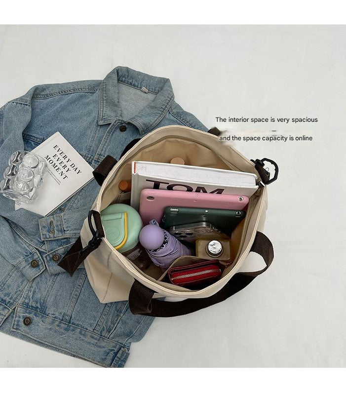 Stylish black canvas tote bag with detachable shoulder strap 5