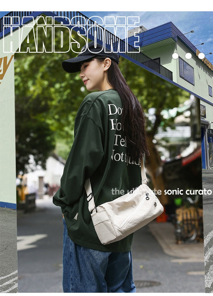 An elegant white shoulder bag for travel and work 3