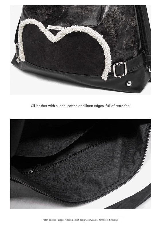 Stylish black tote backpack with heart embellishment - can be worn on one shoulder or as a backpack 6
