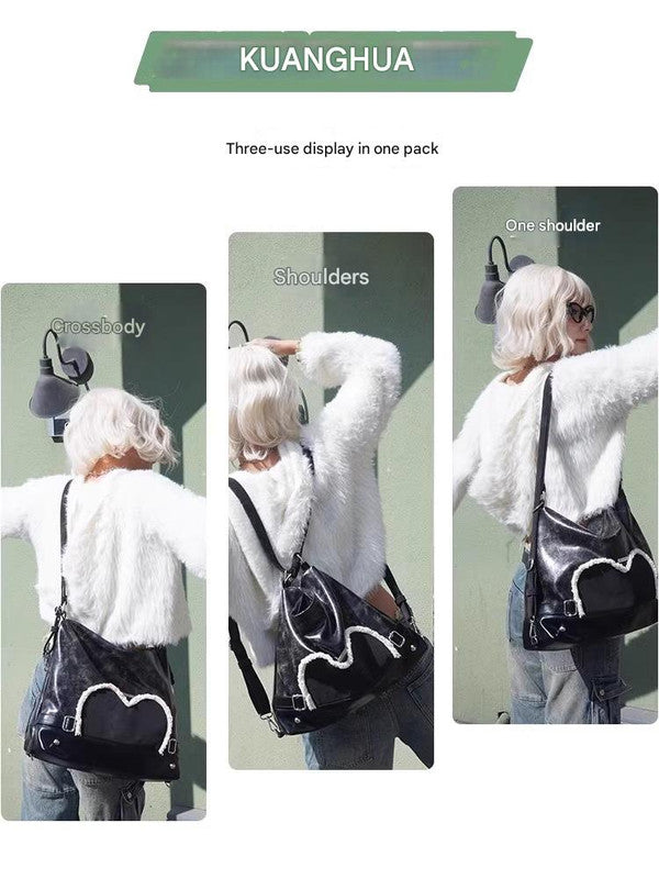 Stylish black tote backpack with heart embellishment - can be worn on one shoulder or as a backpack 7