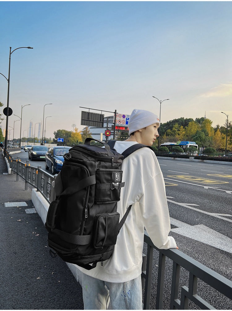 Black Unisex Travel Bag with Utility Buckles and Wet/Dry Compartments 3