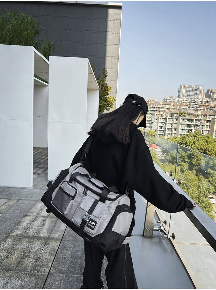 Grey Unisex Travel Bag with Utility Buckles and Wet/Dry Compartments 4