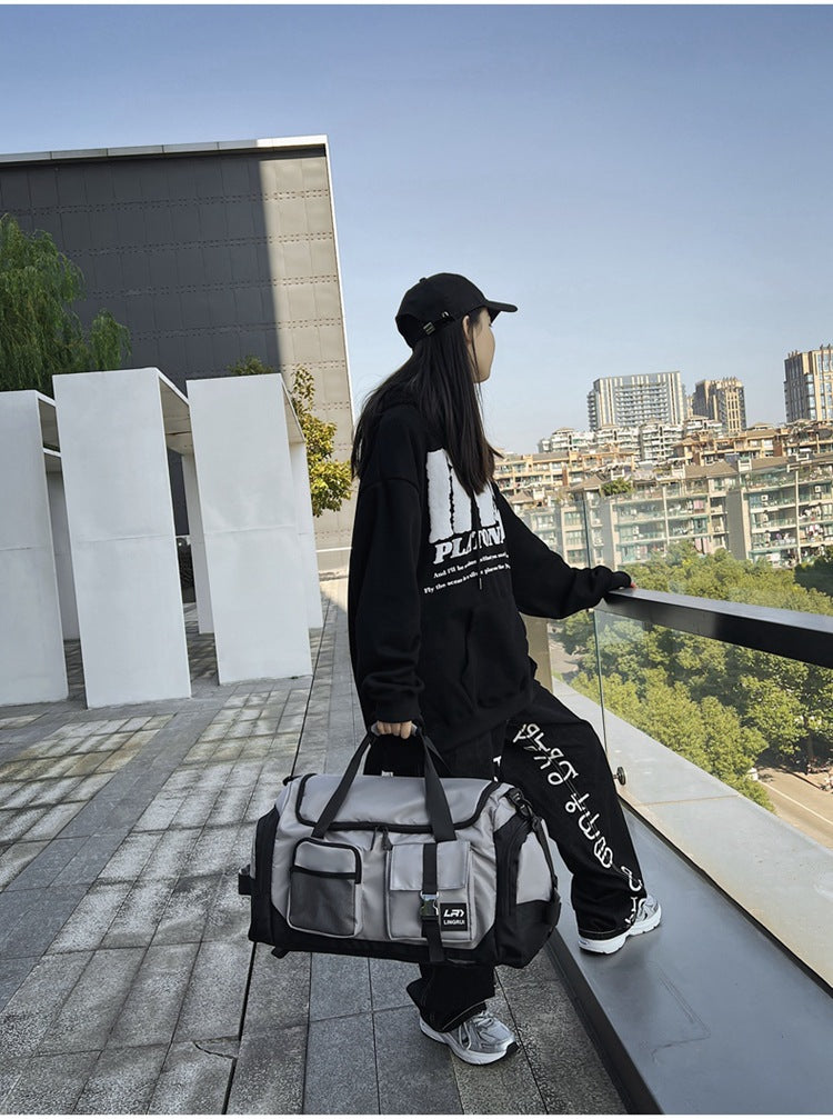 Grey Unisex Travel Bag with Utility Buckles and Wet/Dry Compartments 5