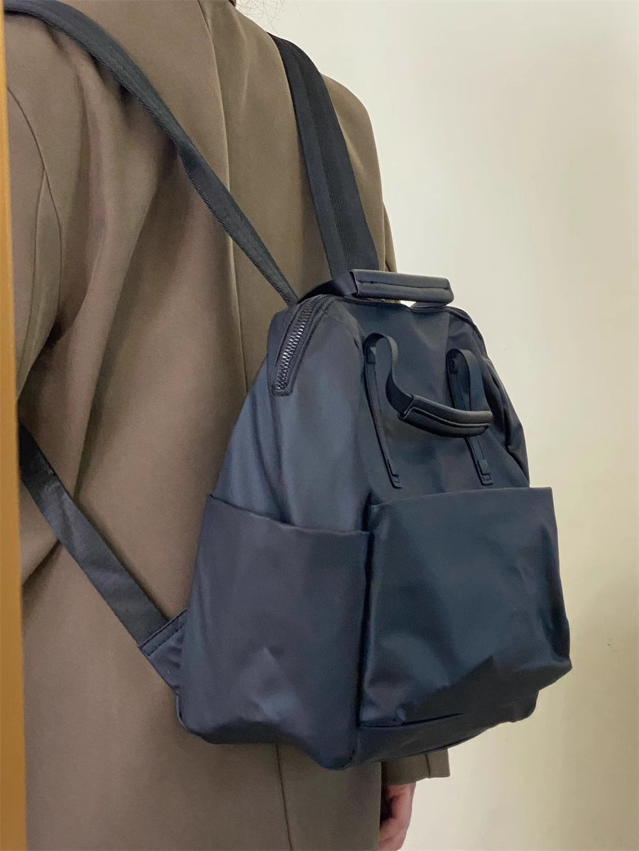 Size L Black Stylish Waterproof Nylon Backpack - Lightweight, Multi-Pocket for Travel, Commute & Daily Use 3